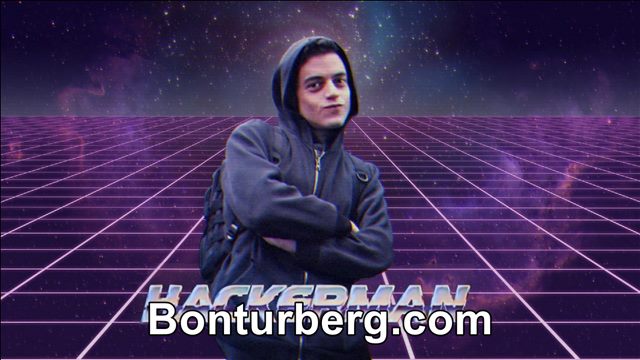Hackerman meme image: Hackerman with Rami Malek posing with crossed arms and half duck face smirk.
